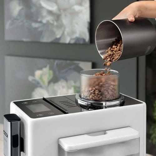 Кофемашина DeLonghi EXAM440.55.W Сменный контейнер для зёрен (2шт.); мерная ложка; полоска для определения жёсткости воды